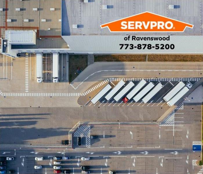 Ariel view of a parking lot of a warehouse.